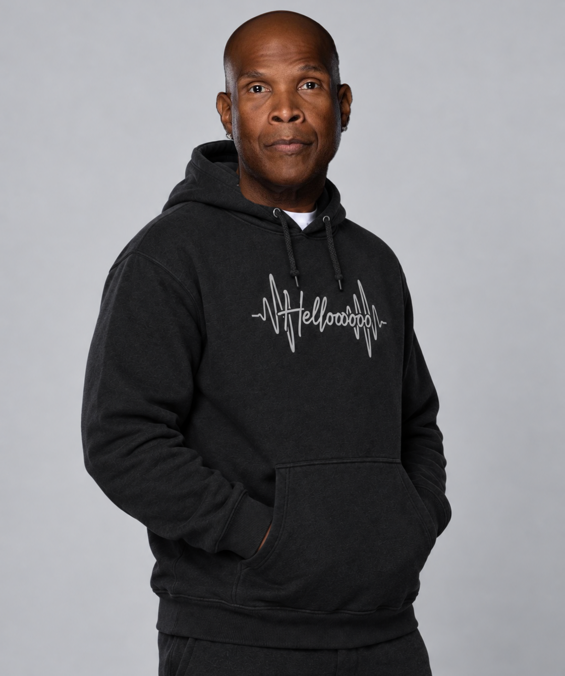HELLOOOOO black hoodie with silver grey print, side model view